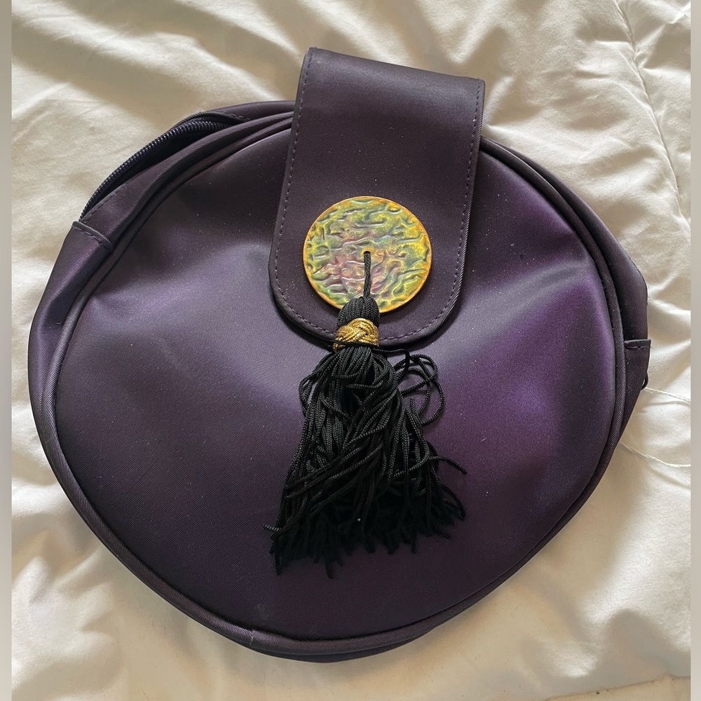 Purple clutch with tassel
